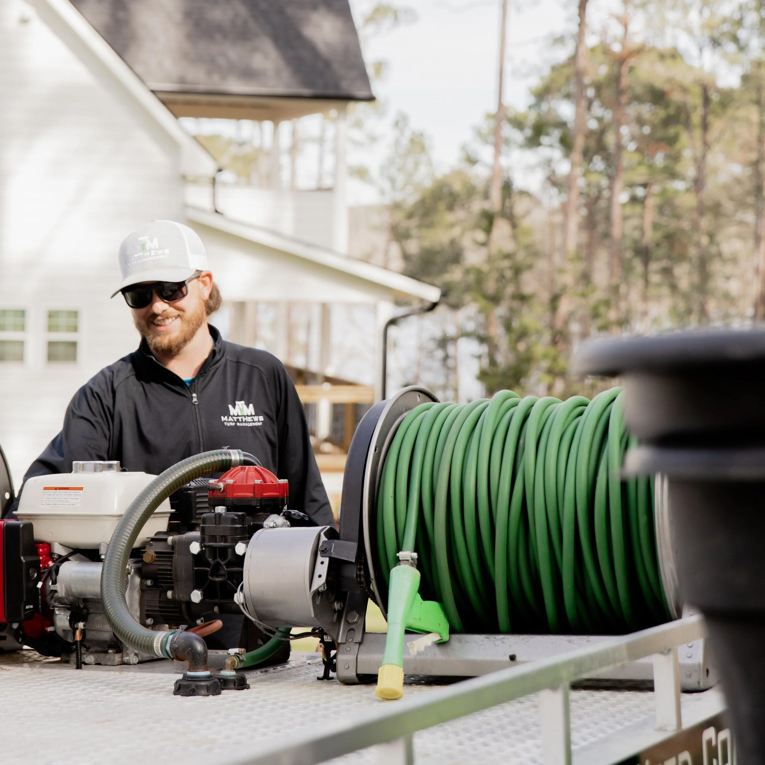 Matthews Turf Management lawn care equipment in use